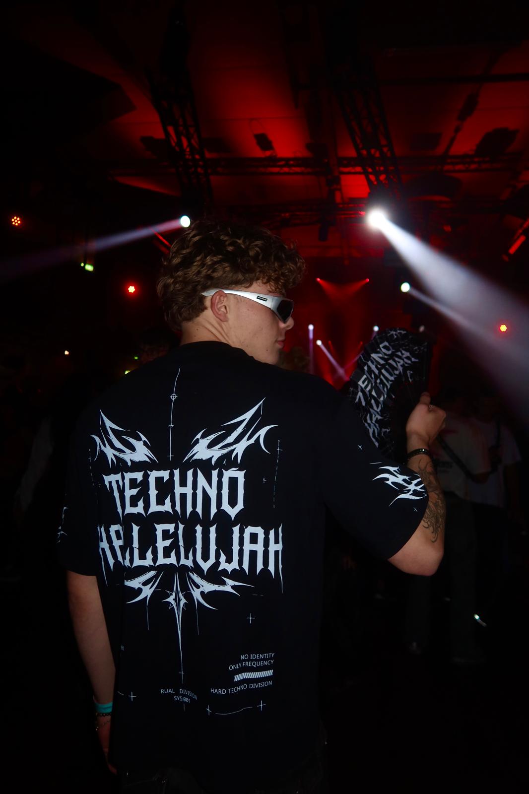 Raver wearing the RUAL Techno Hallelujah Tee in the club